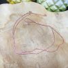 Rosekleurige ketting, halflang
